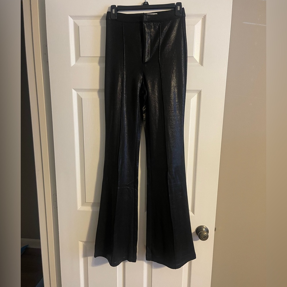 Fun! Slinky! Flare leg! Faux leather look!NEVER WORN